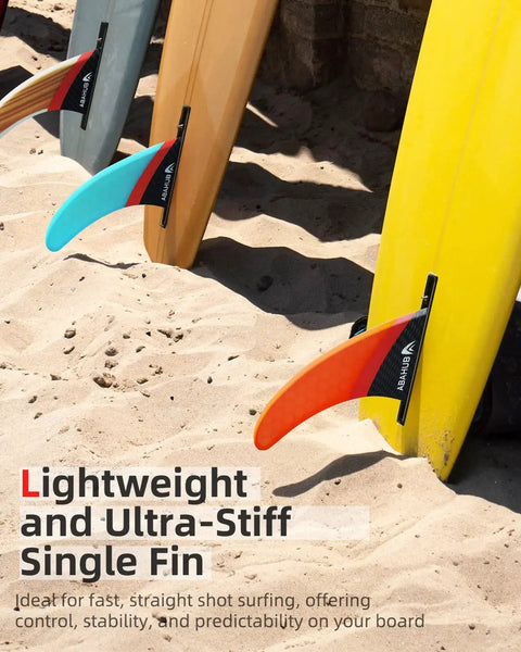 9 Inch SUP Center Fin With Cross Screw For Surfboard Stand Up Paddleboard And Longboard Fiberglass Honeycomb Orange Replacement Fin For Dope Maneuverability And Quick Response installed on paddleboard in sand