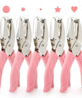 Five Pack Handheld Hole Punch Set With Metal Punches In Circle Heart and Star Shapes for DIY Crafts, solid pink handles visible