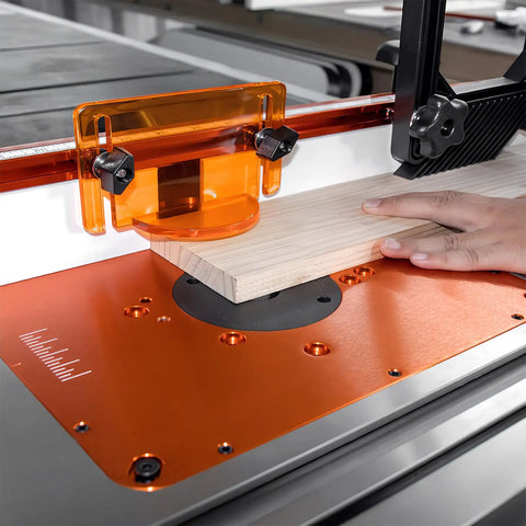 Dead Flat Cast Iron Router Table Extension Wing, 27 By 16 Inches, used for precision routing with safety guard in place.