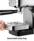 Close-up of detachable drip tray on Compact Espresso Machine With 20 Bar Pump And Milk Frother Steam Wand For Barista Grade Lattes And Cappuccinos At Home 1350W Fast Heating 40 Ounce Removable Water Tank Stainless Steel Silver