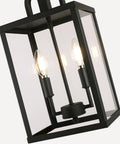 Heck Of A Solid Knockout Outdoor And Indoor Pendant Light With Sleek Black Steel Build And Clear Glass Shade showing dual bulbs.
