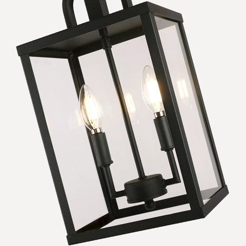 Heck Of A Solid Knockout Outdoor And Indoor Pendant Light With Sleek Black Steel Build And Clear Glass Shade showing dual bulbs.