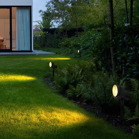 Outdoor use of PAR36 LED Landscape Bulb 10W 1150LM 3000K Warm White illuminating garden path, six-pack.