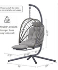 Cozy Outdoor Egg Swing Chair With Stand And Footrest Deep Cushioned Hammock Style Seat For Patio Or Indoor Use Waterproof Rattan Sturdy Metal Frame Comfy Lounge Chair In Dark Gray