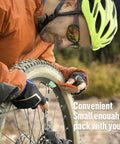 Cyclist using Heavy Duty Bike Tire Levers Two Pack With Steel Core And Anti Slip Grip For Mountain Road And BMX Bikes Tubeless Tire Tools