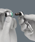 Hands holding a ratchet and socket from Kraftform Kompakt Zyklop Mini 27 Piece Ratchet Set Built For Tight Spaces With Drop Forged Full Steel Construction