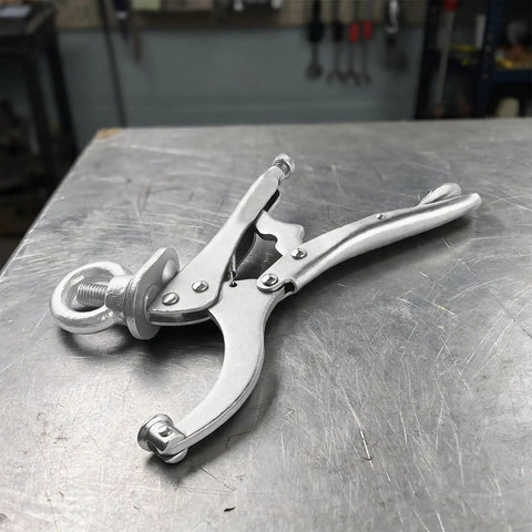 Bulletproof 9 Inch Drill Press Locking Clamp With Killer Jaw Tension For Hella Secure Workpiece Holding On Shop Benches Or Mobile Tool Cart Racks Two Pack on metal surface.