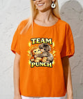 Woman wearing Team Punch T-shirt with cartoon graphic, demonstrating front view of Six Pack 7x7 Inch Iron On Transfers for T Shirts and Hoodies.