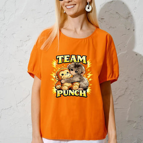 Woman wearing Team Punch T-shirt with cartoon graphic, demonstrating front view of Six Pack 7x7 Inch Iron On Transfers for T Shirts and Hoodies.