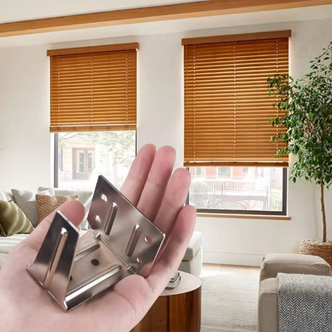 Hand holding Beefy Center Support Bracket For 2 Inch Horizontal Blinds Fits 2 By 2 One Quarter Inch Headrail Ceiling Inside And Outside Mount Works