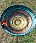 Top view of 38 Inch Vintage Bird Bath With Five Prong Stake For Outdoor Gardens, metal yard decor with butterfly edge