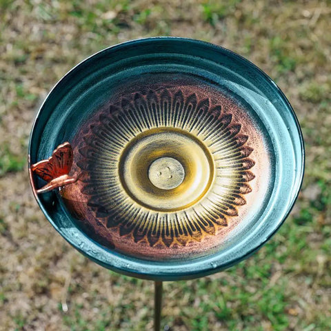 Top view of 38 Inch Vintage Bird Bath With Five Prong Stake For Outdoor Gardens, metal yard decor with butterfly edge