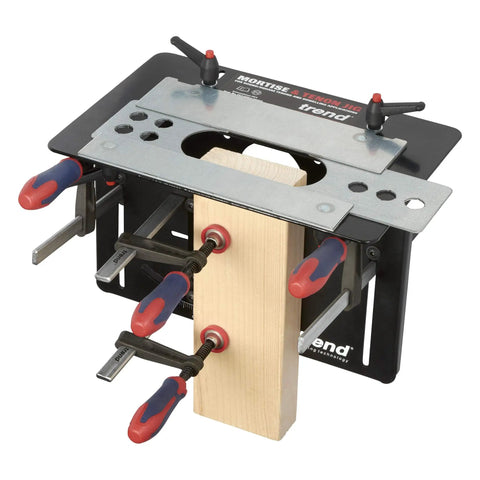 Dead On Mortise And Tenon Jig For Plunge Routers, adjustable jig with clamps holding wood for precise cuts.