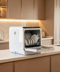 Snappy Portable Countertop Dishwasher With Built In One Point Six Gallon Tank For No Sweat Cleaning Top Shelf Results And Quick Faucet Hookup Without Messy Drain Lines, white, open with dishes.