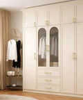 Brushed Gold Cabinet Pulls 5 Inch Zinc Alloy Handles Set of 10 installed on white wardrobe doors