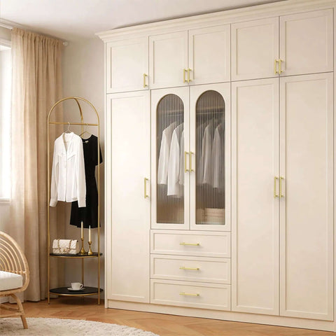 Brushed Gold Cabinet Pulls 5 Inch Zinc Alloy Handles Set of 10 installed on white wardrobe doors