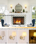 Living room with Set of Two Plug in Wall Sconces with On Off Switch Modern Gold Fabric Shade Wall Lamps on fireplace wall