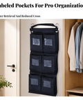 Slick Heavy Duty Six Pocket Hanging Closet Organizer With Reinforced Carry Handle And Breathable Storage Slots For Streamlined Wardrobe Sorting And Daily No Stress Organization In Matte Black hanging on door with labeled pockets.