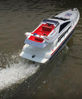 2.4G Wireless RC Speed Demon Racing Boat With Luxury Yacht Styling on water, realistic hull, easy remote control
