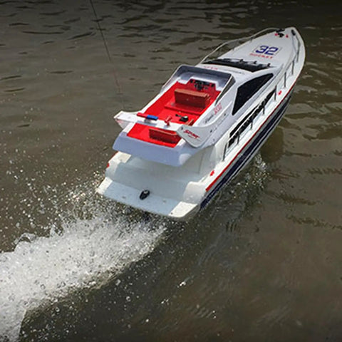 2.4G Wireless RC Speed Demon Racing Boat With Luxury Yacht Styling on water, realistic hull, easy remote control