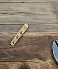8 Pack Copper Door Shaft Rotation Hinges With Top And Bottom Pivot, Heavy Duty Support on a wooden surface with a wrench