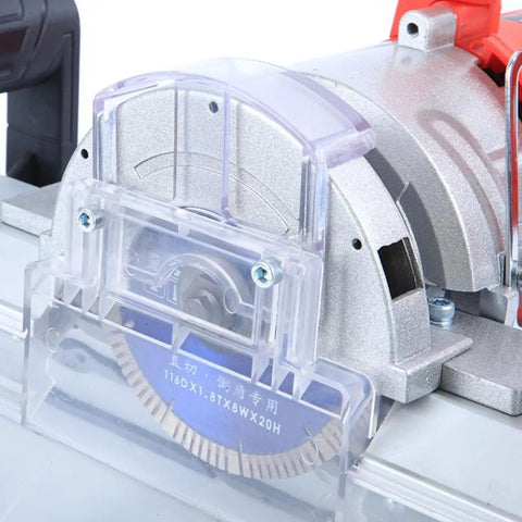 Close-up of Heavy Duty Electric Tile Bevel Cutter Knocks Out Gnarly Chamfers 13000 Rpm Cutting Machine with spinning blade.