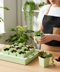 Woman using 9-Cell Seed Starter Tray Kit With 2.56 Inch Deep Reusable Pots For Indoor Outdoor Gardening on a wooden table