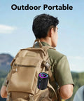 Man with portable Bluetooth speaker on backpack, perfect for travel, sports and parties, with LED light and IPX7 waterproofing.