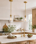 Modern kitchen with Farmhouse Gold Pendant Light Over Kitchen Island With Clear Glass Shade for cozy chic dining area