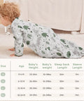 Baby wearing Cozy Sleeved Baby Sleep Sack For 0 To 6 Months Lightweight 0.5 Tog Wearable Blanket crawling on carpet next to size chart.