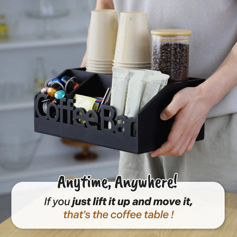 Person holding All In One Coffee Bar Organizer For Countertop Wooden Station Caddy With Tray For Pods Cups Condiments And Accessories Kitchen Or Office Counter Storage Medium Size Black Finish