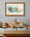 Framed colorful dog art above sleeping dog on beige sofa in living room, complementing decor with a playful touch.