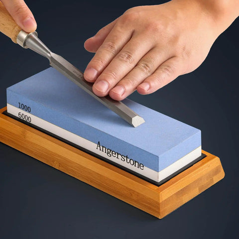 Using Premium Knife Sharpening Stone Whetstone 1000 6000 Grit with Non Slip Base for sharpening a tool by hand