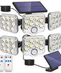 Two Pack Solar Motion Lights Outdoor With Remote Control, Lit Solar Flood Lights For Porch, Shed, Gazebo, And Indoor Use, Security Lighting Kit With Adjustable Solar Panel And 15.4 Ft Cord, showing lights, remote, and cables.