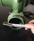 Close-up of Electric Blacksmith Forge Blower 110V 250W For Coal Fires with ruler measuring outlet diameter 380Pa pressure