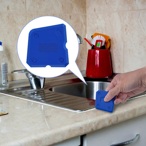 Close-up of Silicone Caulking Tool Set With Multiple Edges For Kitchen And Bathroom Sealant And Grout Finishing Flexible Smoothing Tools Kit Blue Pro Grade For Smoothing Caulk Lines Without Masking Tape And Durable Flexible Silicone Build in hand by sink
