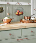 Kitchen with Six Pack 5.04 Inch Center To Center Antique Copper Drawer Pulls Red Bronze Bar Handles on cabinets.