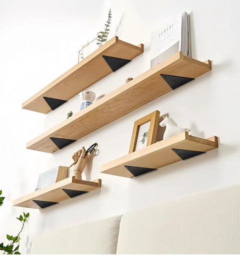 Five Pack Hidden Stainless Steel Shelf Brackets For White Walls Invisible Triangular Wall Mounts supporting wooden shelves.