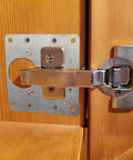 Four Pack Heavy Duty Stainless Steel Hinge Repair Plates With Matching Screws Fix Wobbly Cabinet Doors For Wood Furniture Shelves Quick Install No Sweat Built Tough Real Deal Quality installed on wood cabinet.