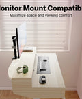 32 By 20 Inch Electric Standing Desk With Four Drawers, adjustable height with C-clamp mount and mouse, keyboard setup.