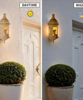 Garita Coqui Frog Wall Lamp with Sound Multi Color Changing Light, remote control, day and night view on white exterior wall.
