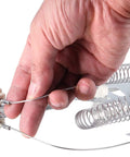 Close-up of hand holding wires of Beefed Up Dryer Heating Element And Thermostat Kit With Thermal Cutoff Fuse Replacement 3387747 WP3387747 Bundle.