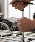 Heavy Duty T Handle Socket Wrench Set for Cars and Bikes, 7 Piece Metric Drive Kit being used to tighten bolts in an engine.
