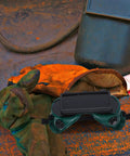 Heavy Duty Welding Glasses And Safety Goggles Featuring Anti Scratch Dual Flip Lens For Industrial Eye Protection on a rugged work surface.