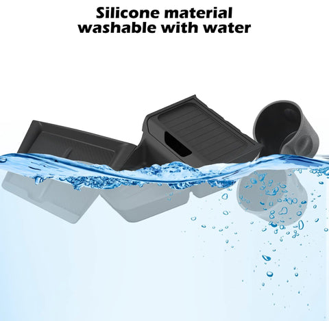 Tesla Model Y Juniper Standard Center Console Organizer Set With A Badass Wireless Charging Pad floats in water showcasing silicone material.
