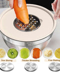 Eight Piece Khaki Stainless Steel Nesting Mixing Bowls With Airtight Lids And Three Grater Attachments For Slicing Grating And Shredding