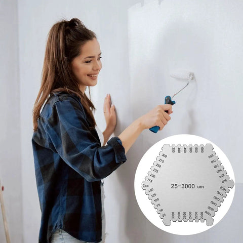 Person painting wall with Pro Grade Wet Film Thickness Gauge Hexagon Comb For Paint Coatings And Lab Use Measures 25 To 3000 Microns visible