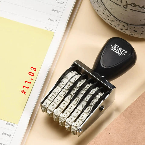 Everyday Kickass Six Digit Rubber Number Stamp Featuring Auto Rolling Dial For Quick Numbering Precise Date Stamping And Heavy Duty Office Project Grind on desk.