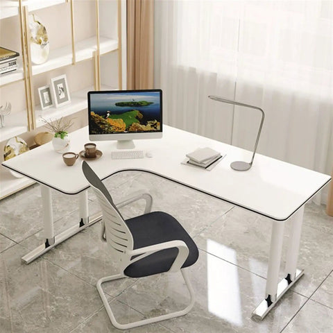 Built Different L Shaped Corner Computer Desk For Compact Rooms And Modern Home Offices featuring matte white finish and sleek design.
