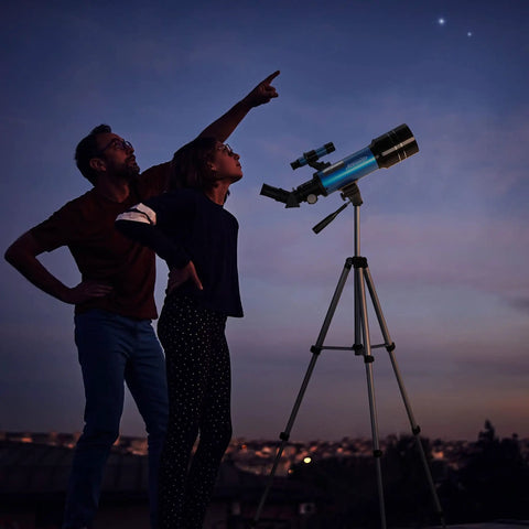 70mm Travel Astronomy Telescope With 400mm Focal Length And 70mm Aperture, K6 And K25 Eyepieces, 45 Degree Erect Diagonal, Adjustable Tripod, Phone Adapter, Great For Beginners And Stargazers on tripod with two people viewing stars